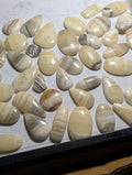 One Dollar Intuitively Chosen Banded Yellow Calcite Cabochon